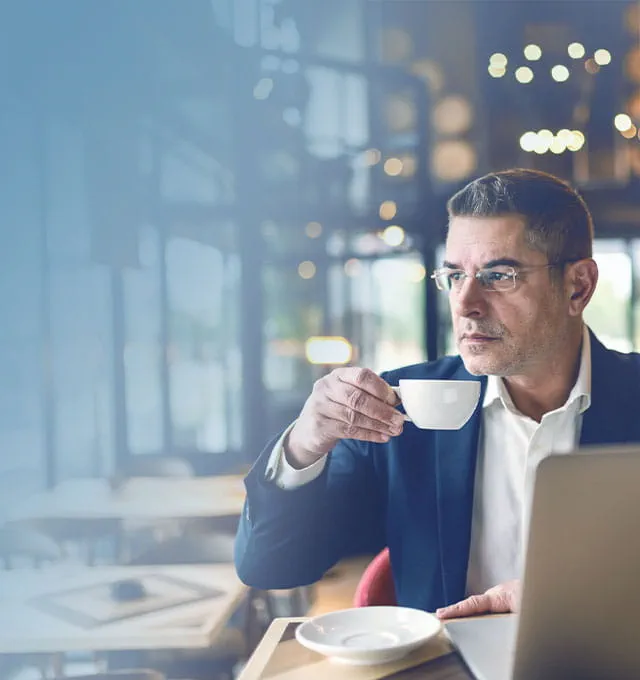 Business owner drinking coffee