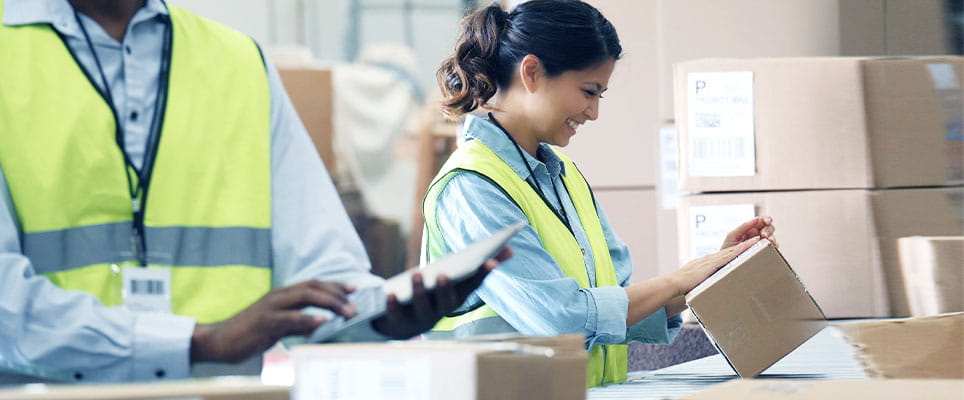 Employees labeling packages