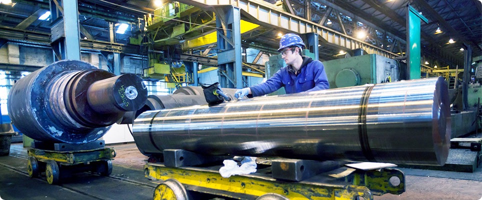 Man fixing machinery in the factory