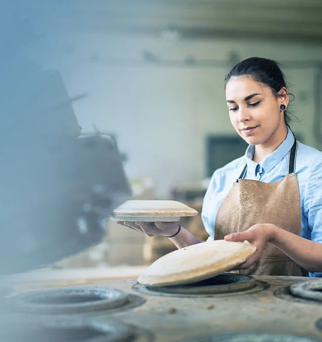 Woman making pottery 