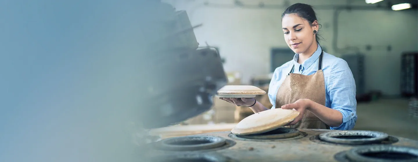Woman making pottery 