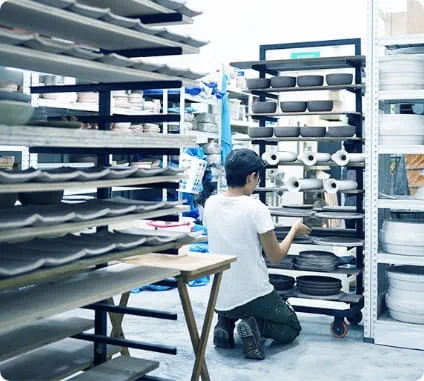 Warehouse with stock of ceramic dishes